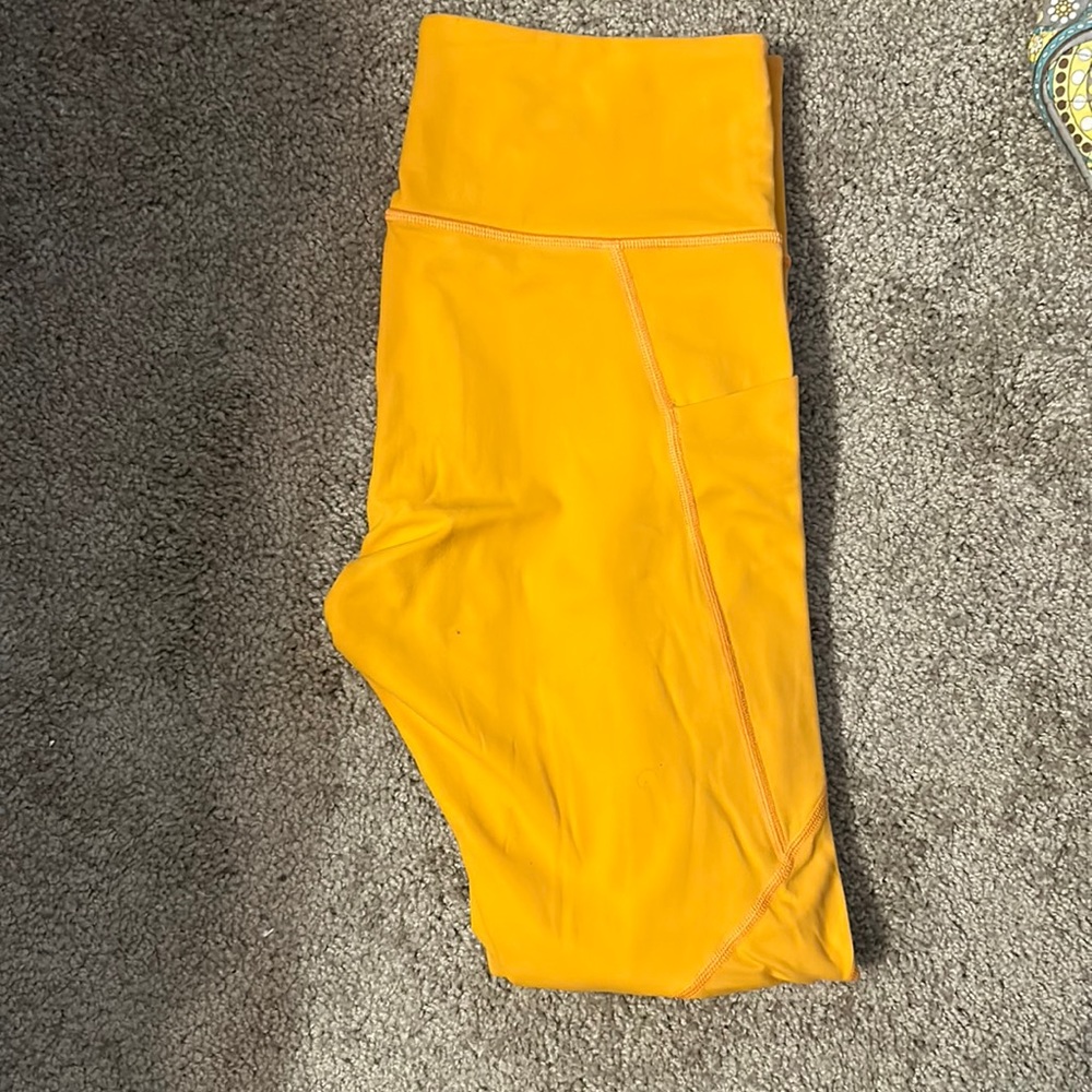 Athlete Sun salutations stash leggings with pockets